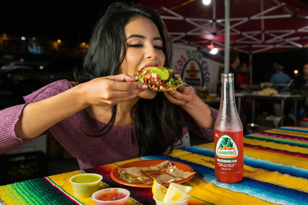 Female eating Mexican food 